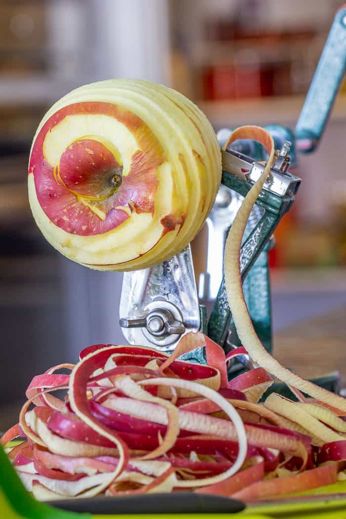 Peeling apples with an apple tool.