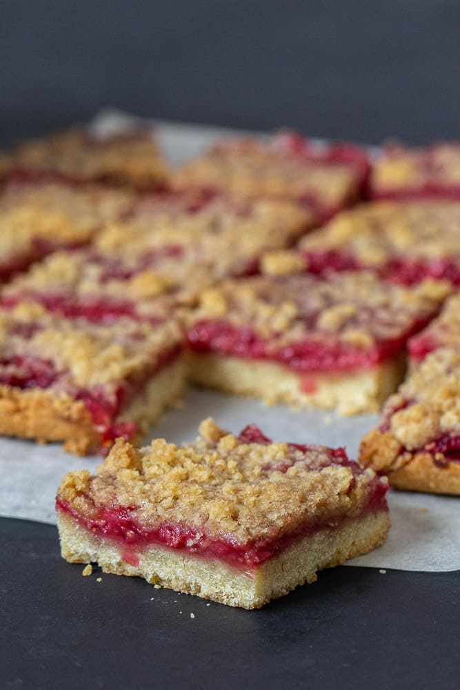 Sliced raspberry pie bars vertical