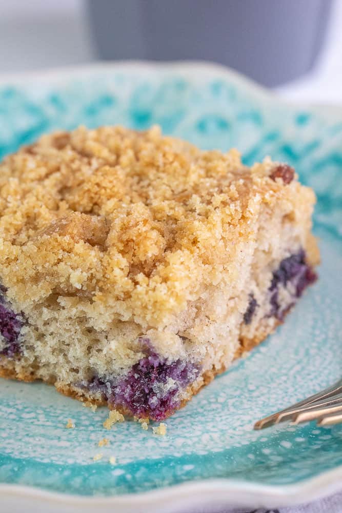 Blueberry coffee cake slice vertical