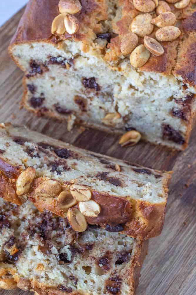 overhead sliced banana bread with peanuts and chocolate