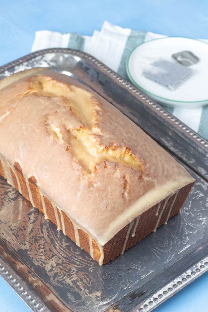 loaf cake on a tray with glaze