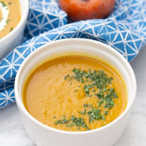 persimmon sweet potato soup with chopped parsley
