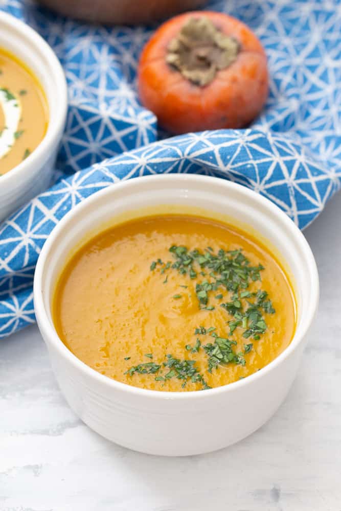 persimmon sweet potato soup with chopped parsley