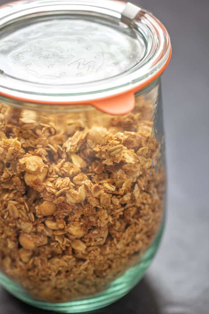 close up of granola in a glass jar