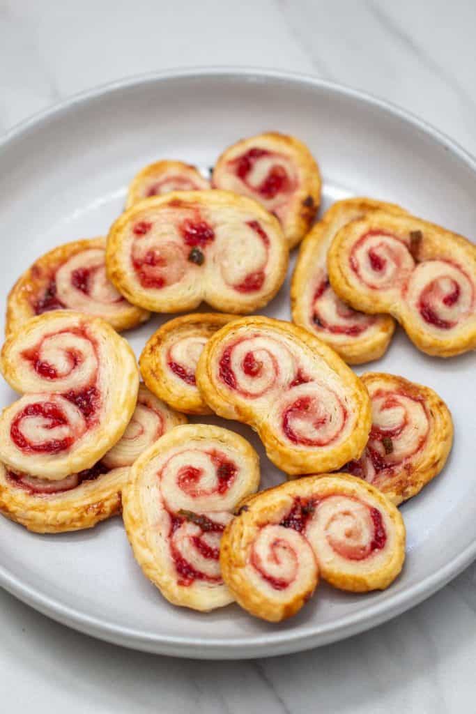 strawberry jalapeno palmiers on a gray plate