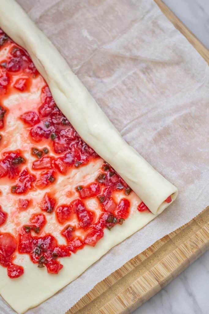halfway rolled puff pastry with strawberry jalapeno spread