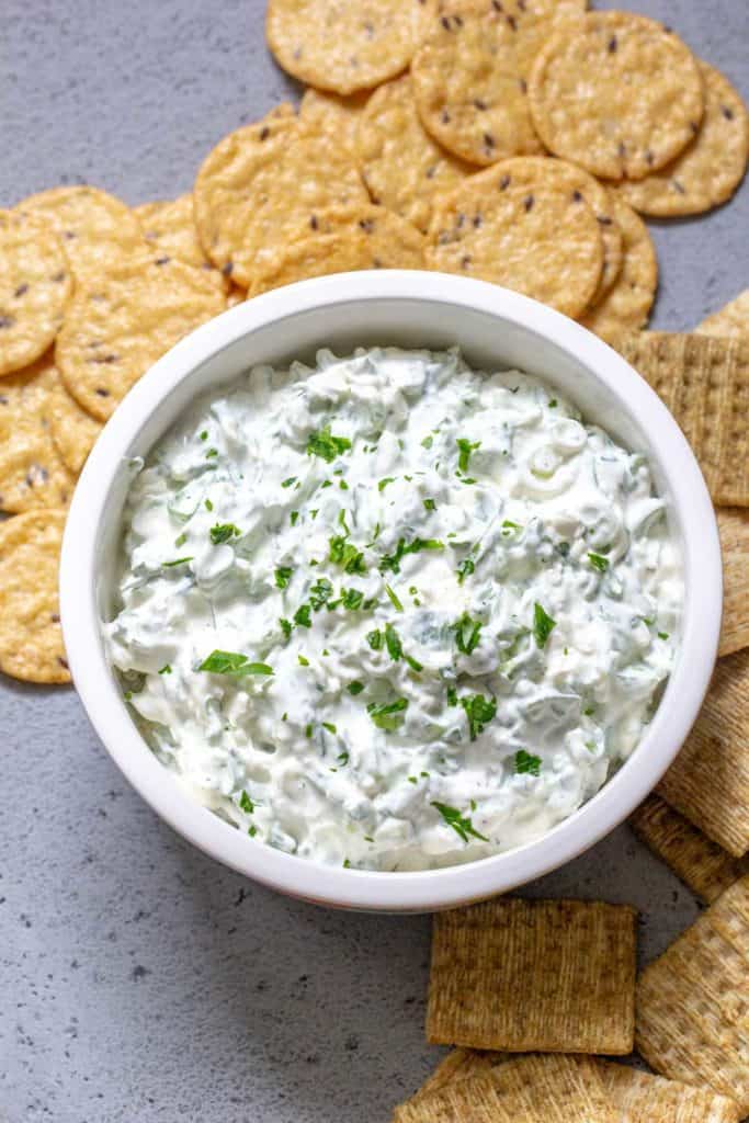 overhead of green onion dip in a bowl