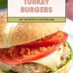 A turkey burger with lettuce, melted cheese, and tomato slices on a bun, with text: “Hatch Chile Turkey Burgers. Get the recipe at stetted.com.”.