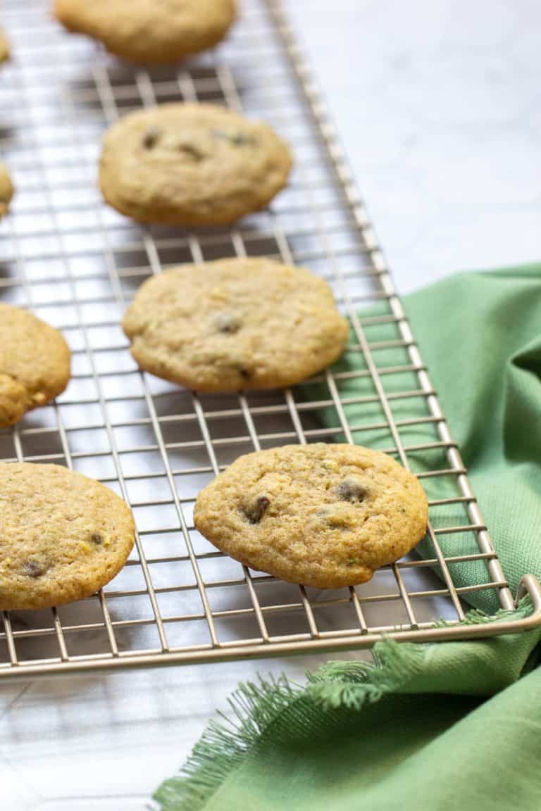 zucchini chocolate chip cookies resting on cooling rack
