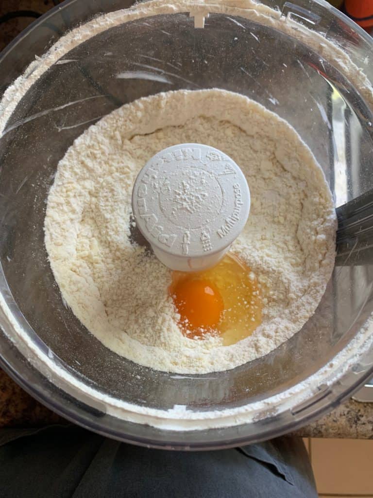 mixing ingredients in a glass bowl