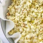 serving bowl of pesto popcorn