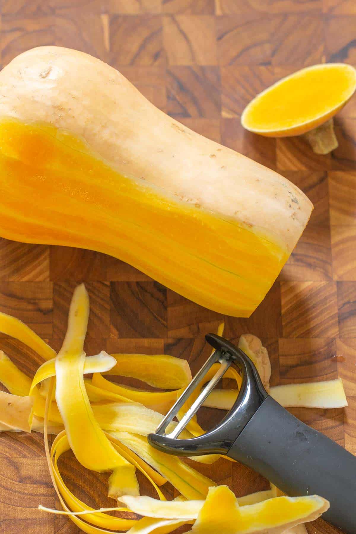 peeling butternut squash