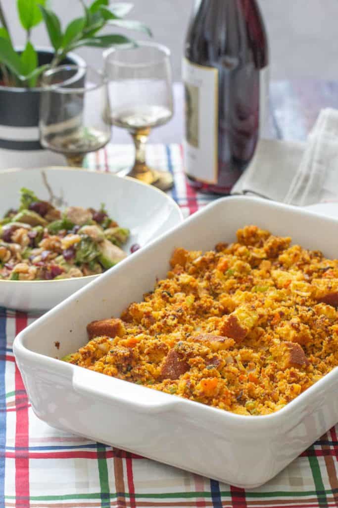 chorizo cornbread stuffing in baking dish on holiday table