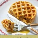 A plate with peanut butter waffles, a fork holding a cut piece, a knife, and syrup, with the text "peanut butter waffles" at the bottom.