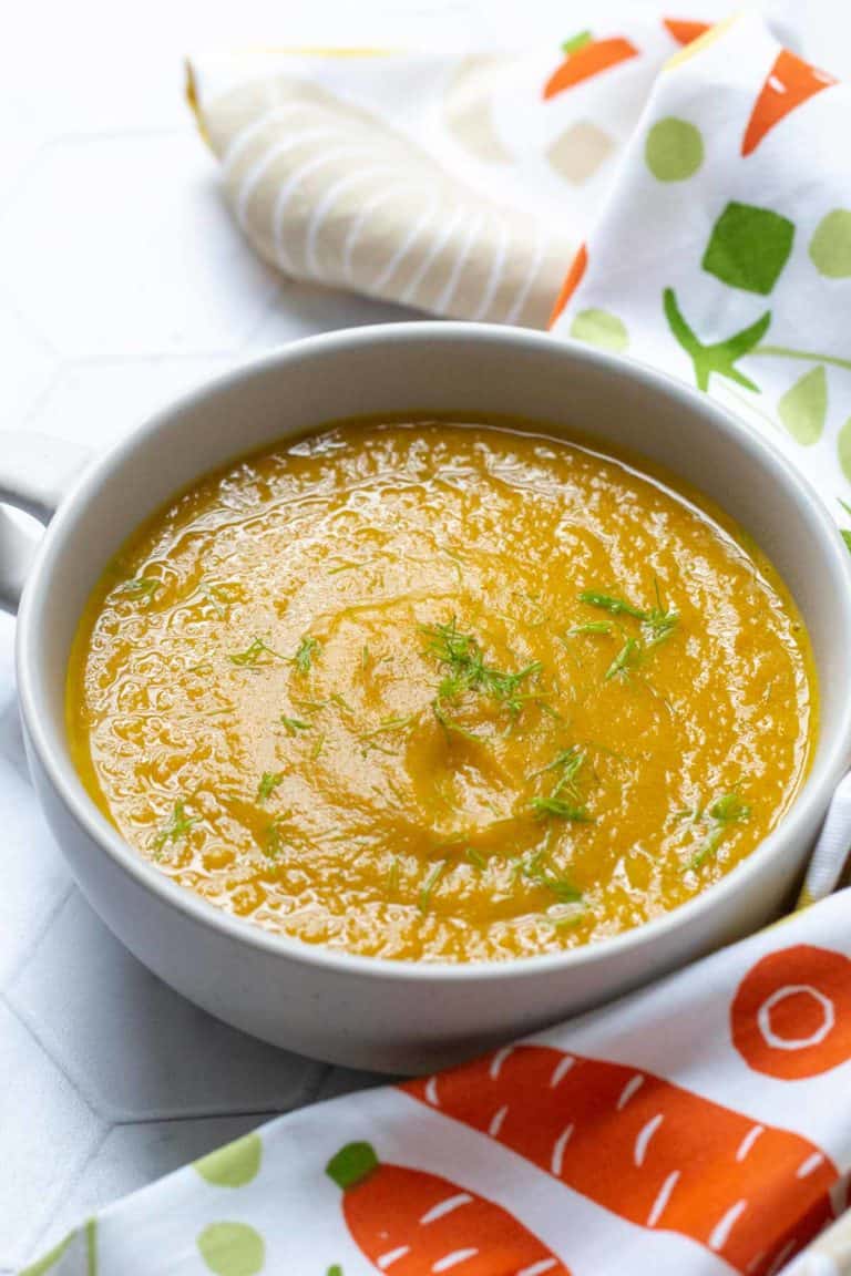 close up of roasted carrot fennel soup in a bowl