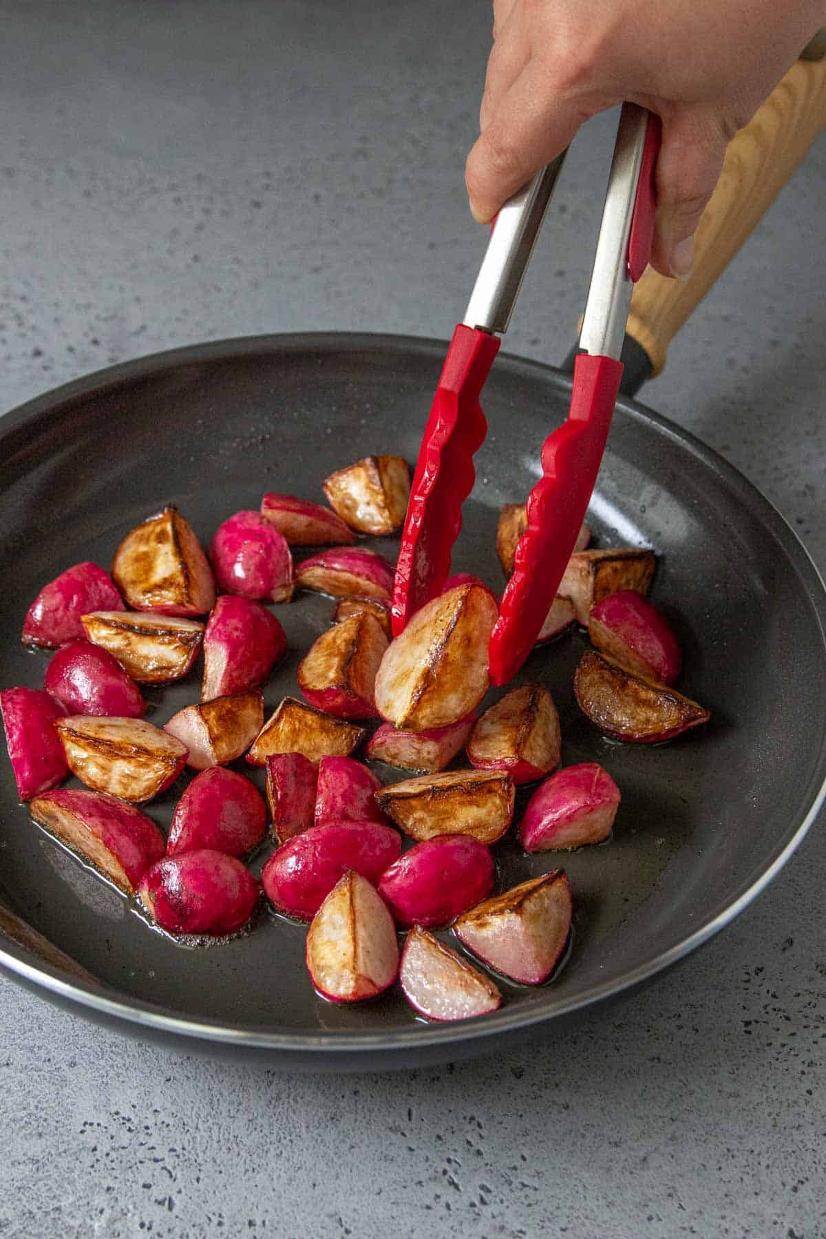 sauteed radishes in a frying pan
