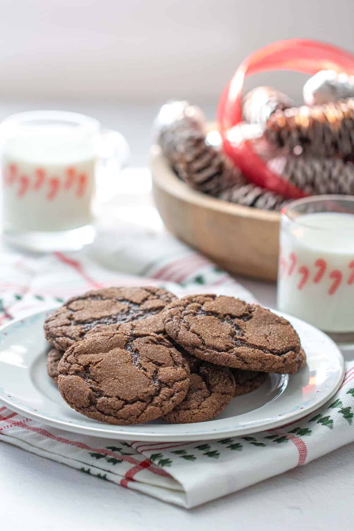 Mexican hot chocolate cookies on a plate with holiday decor