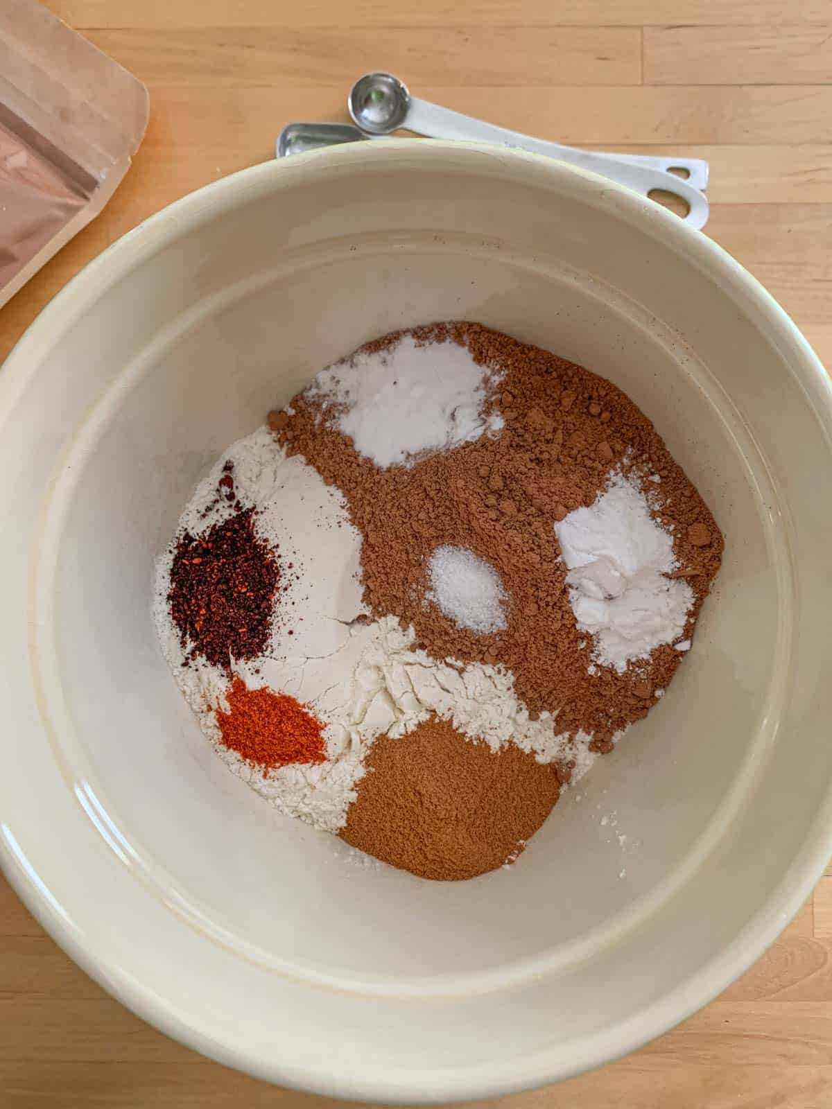flour, cocoa, and spices in mixing bowl