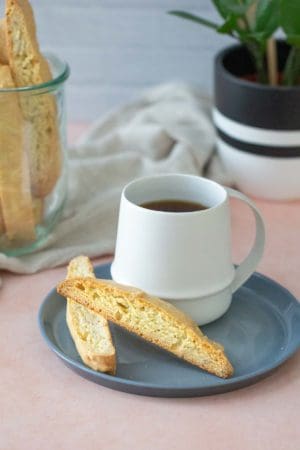 almond biscotti on a gray plate with coffee
