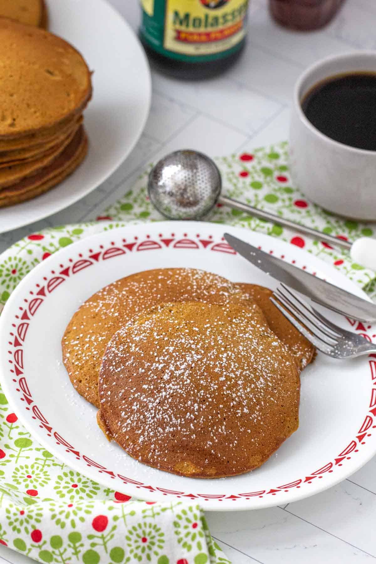 gingerbread pancakes with fork and knife