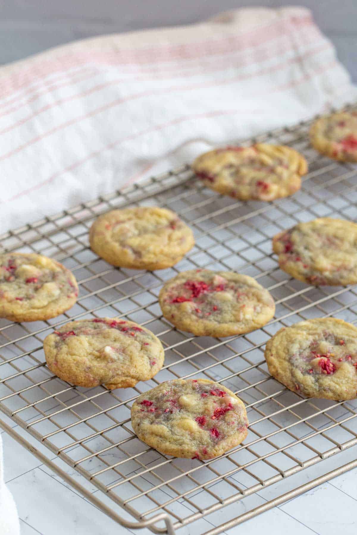white chocolate raspberry cookies on cooling rack