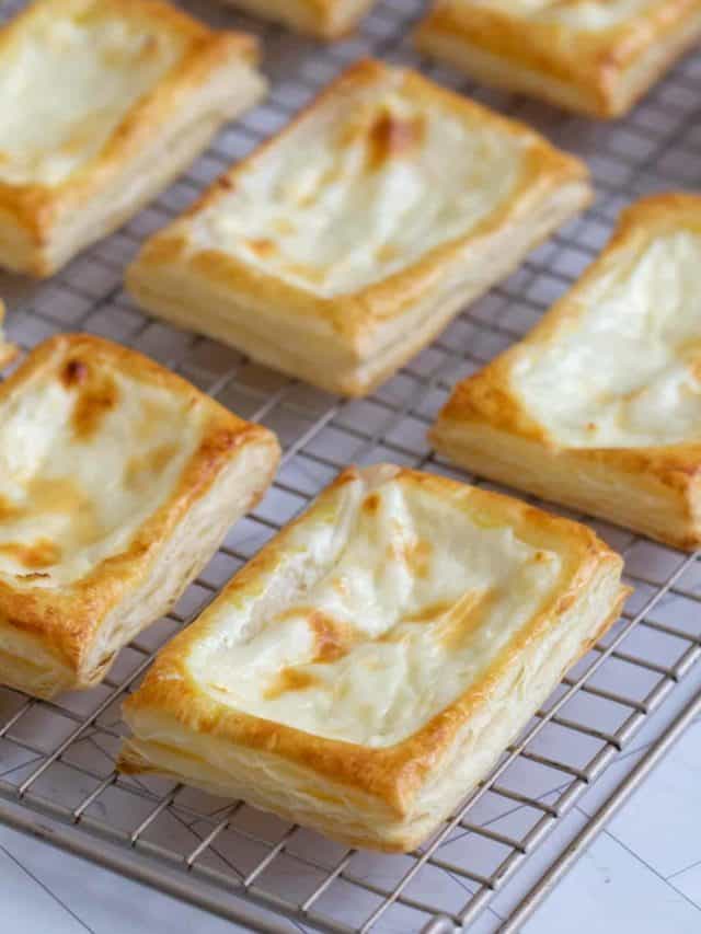 Cheese danishes on a cooling rack