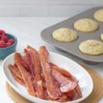 baked bacon on serving platter