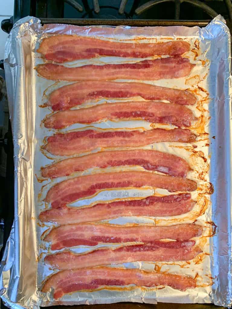 baked bacon on baking sheet