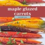 Colorful maple glazed carrots, coated with a shiny maple glaze and garnished with chopped herbs, are artfully arranged on a white plate beneath the text overlay "maple glazed carrots.