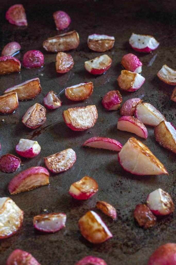 roasted radishes on baking sheet
