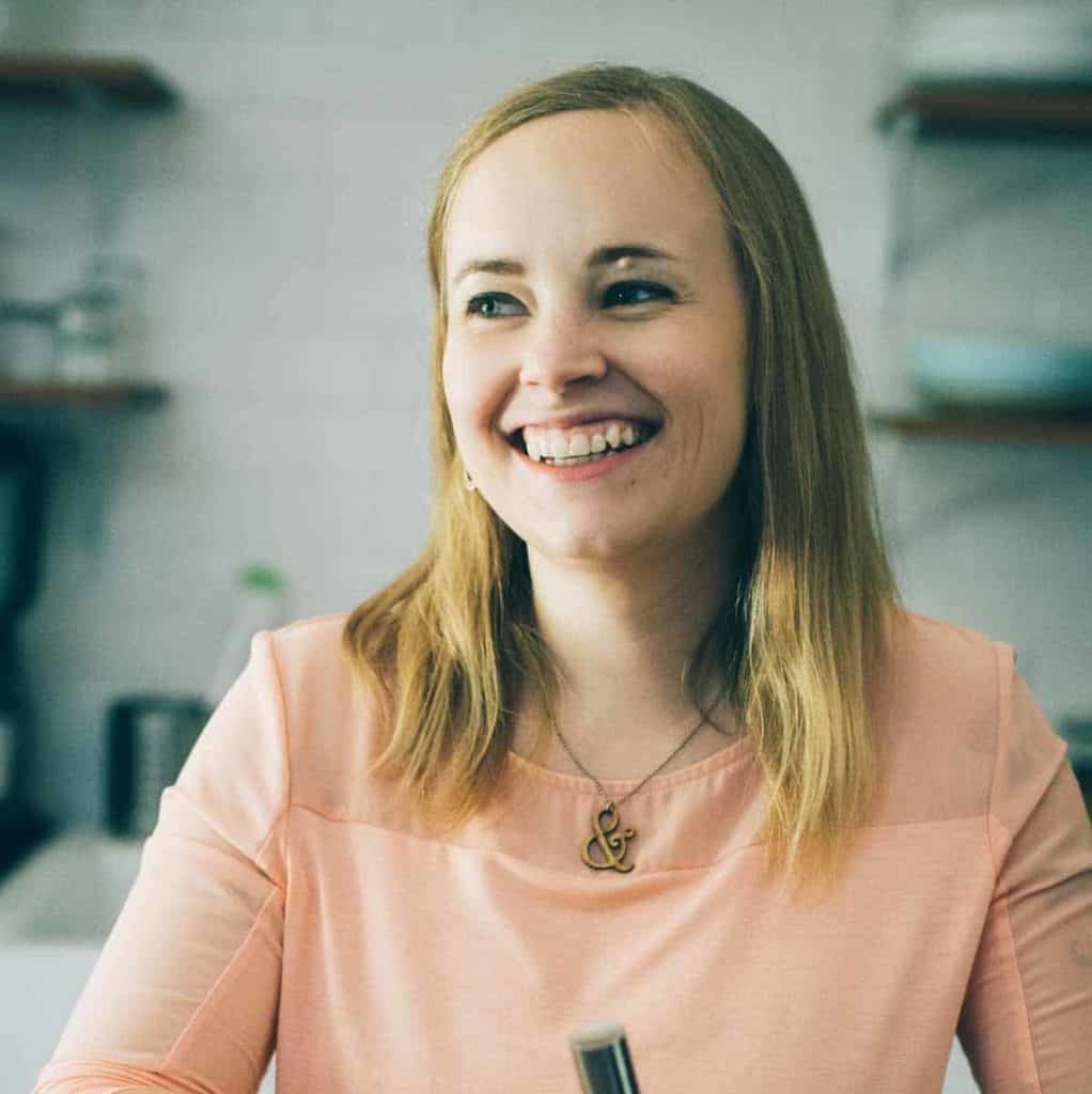 blond woman with bowl and whisk