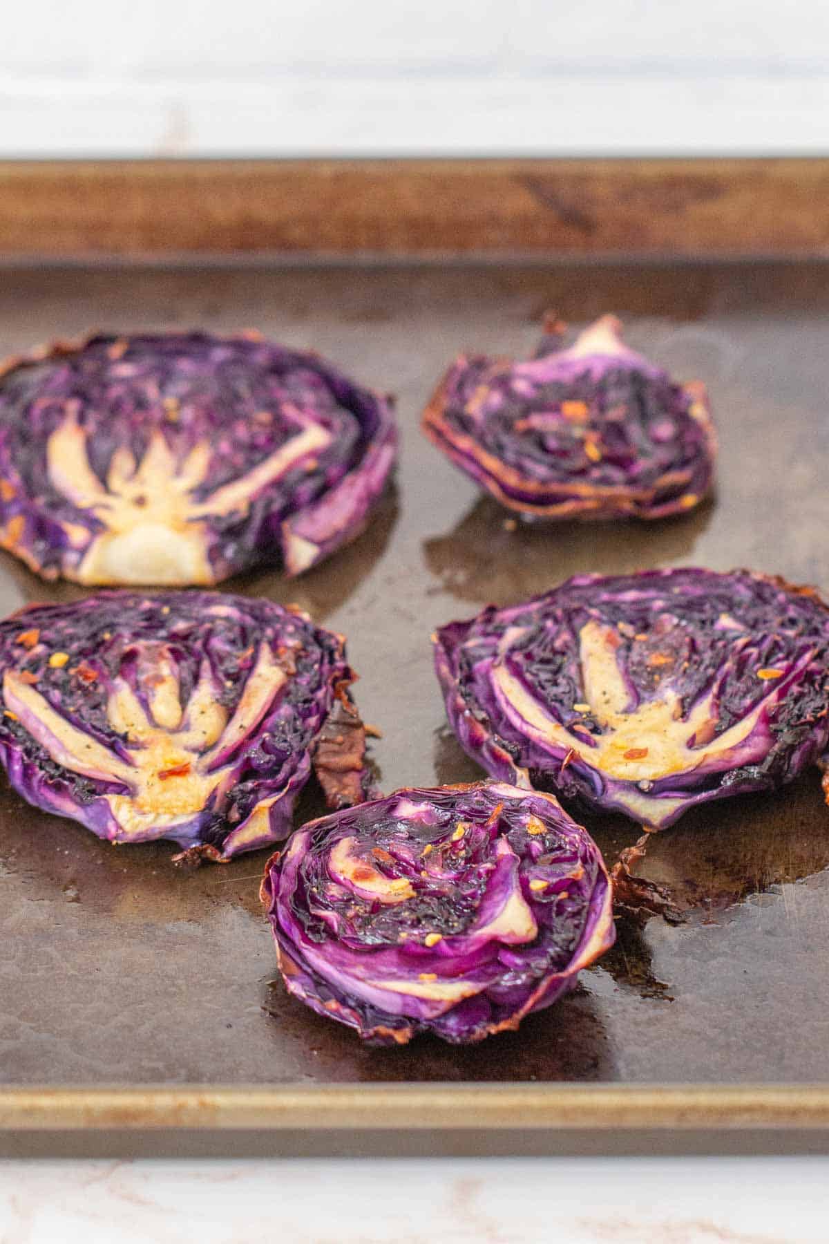 roasted cabbage steaks on baking pan