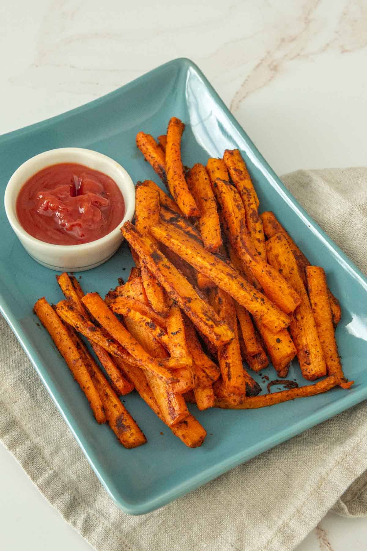 carrot fries on blue plate