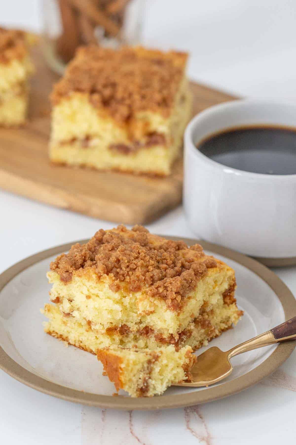 cinnamon coffee cake with piece on fork