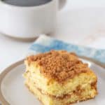 cinnamon coffee cake on plate with coffee