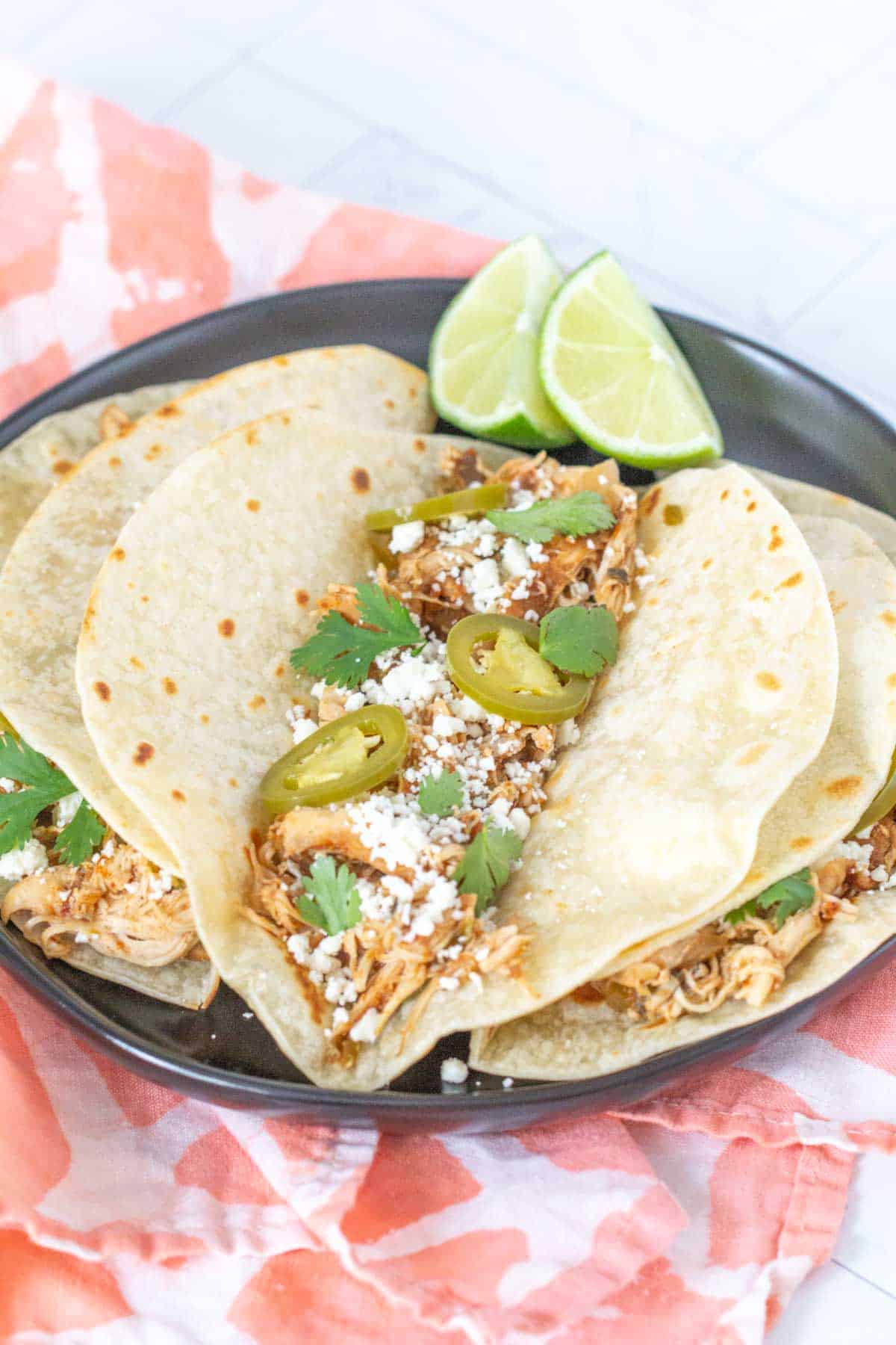 slow cooker chicken tacos on plate