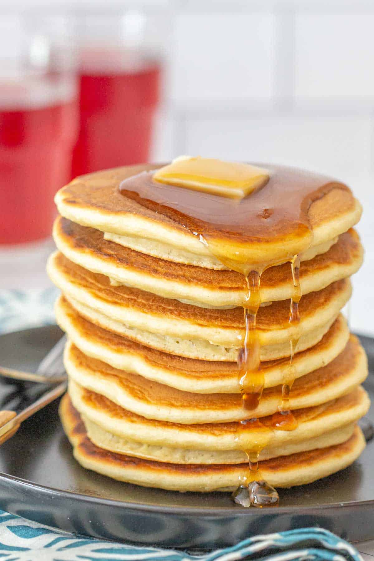 applesauce pancakes with syrup dripping