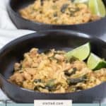 Two black bowls filled with flavorful chicken poblano rice, garnished with lime wedges. The text "chicken poblano" appears on a label at the bottom.