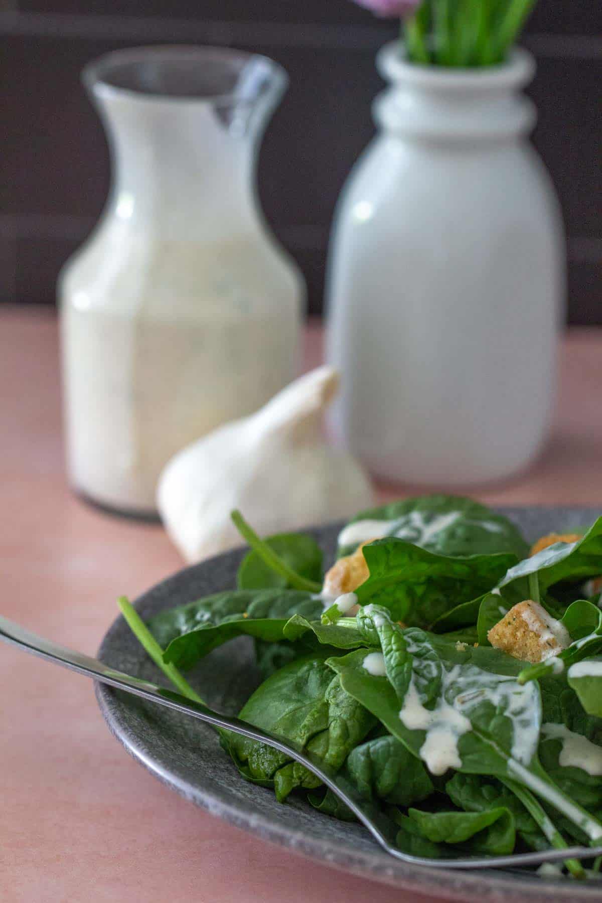 creamy garlic dressing on salad