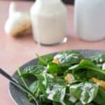 garlic dressing on spinach salad