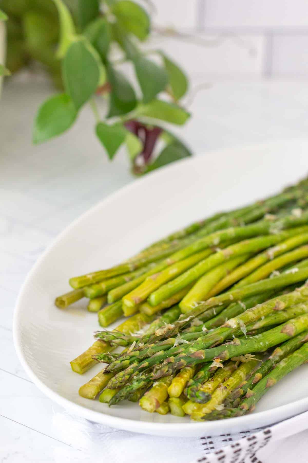 roasted parmesan asparagus on serving dish