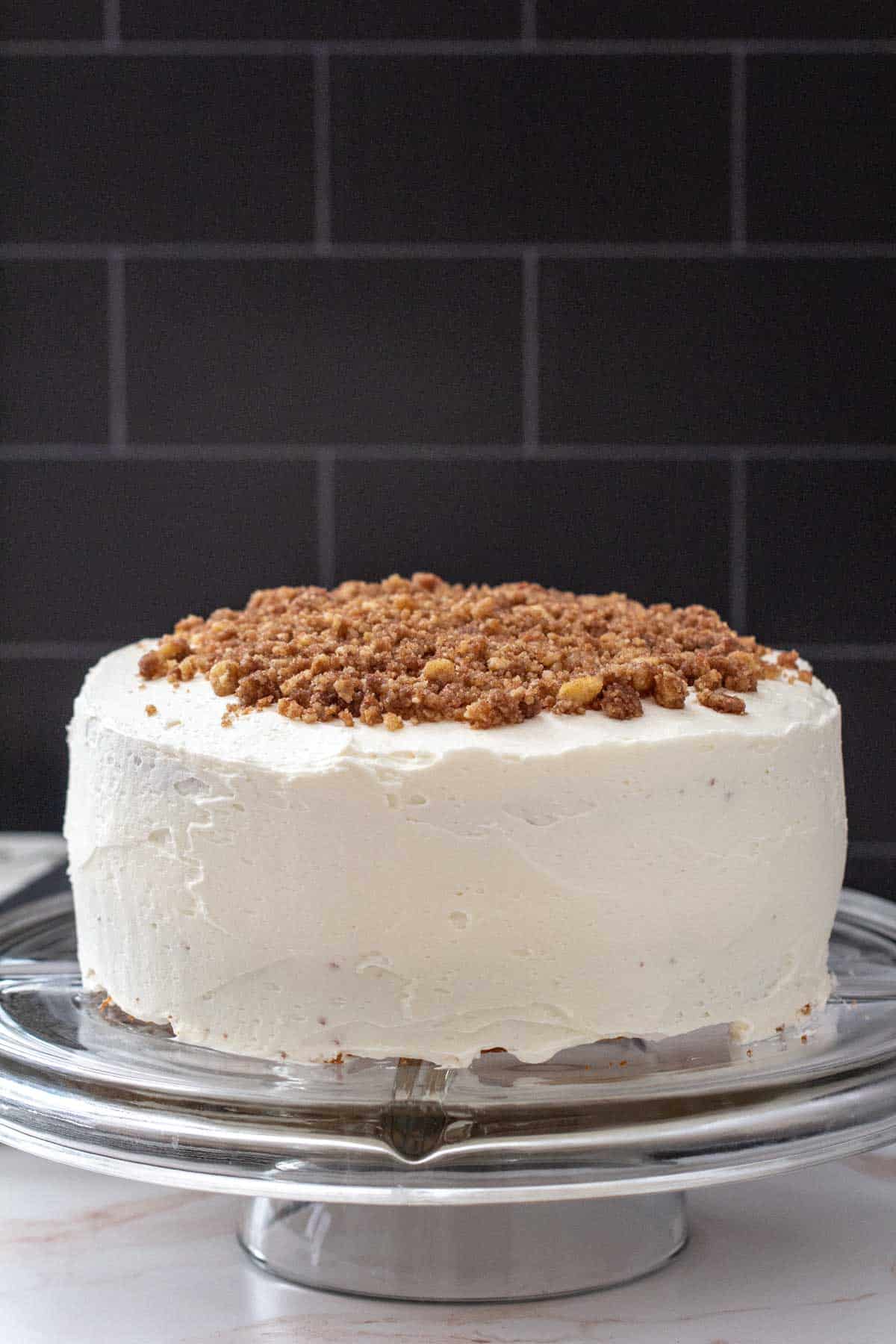 snickerdoodle cake on cake stand