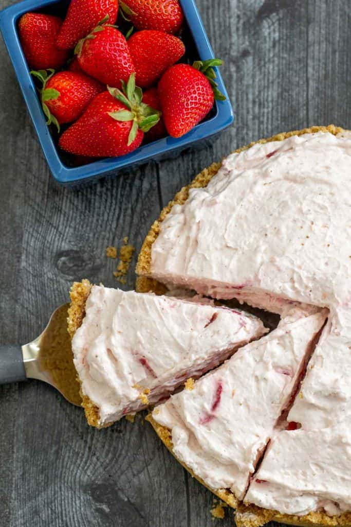 overhead sliced strawberry chiffon pie