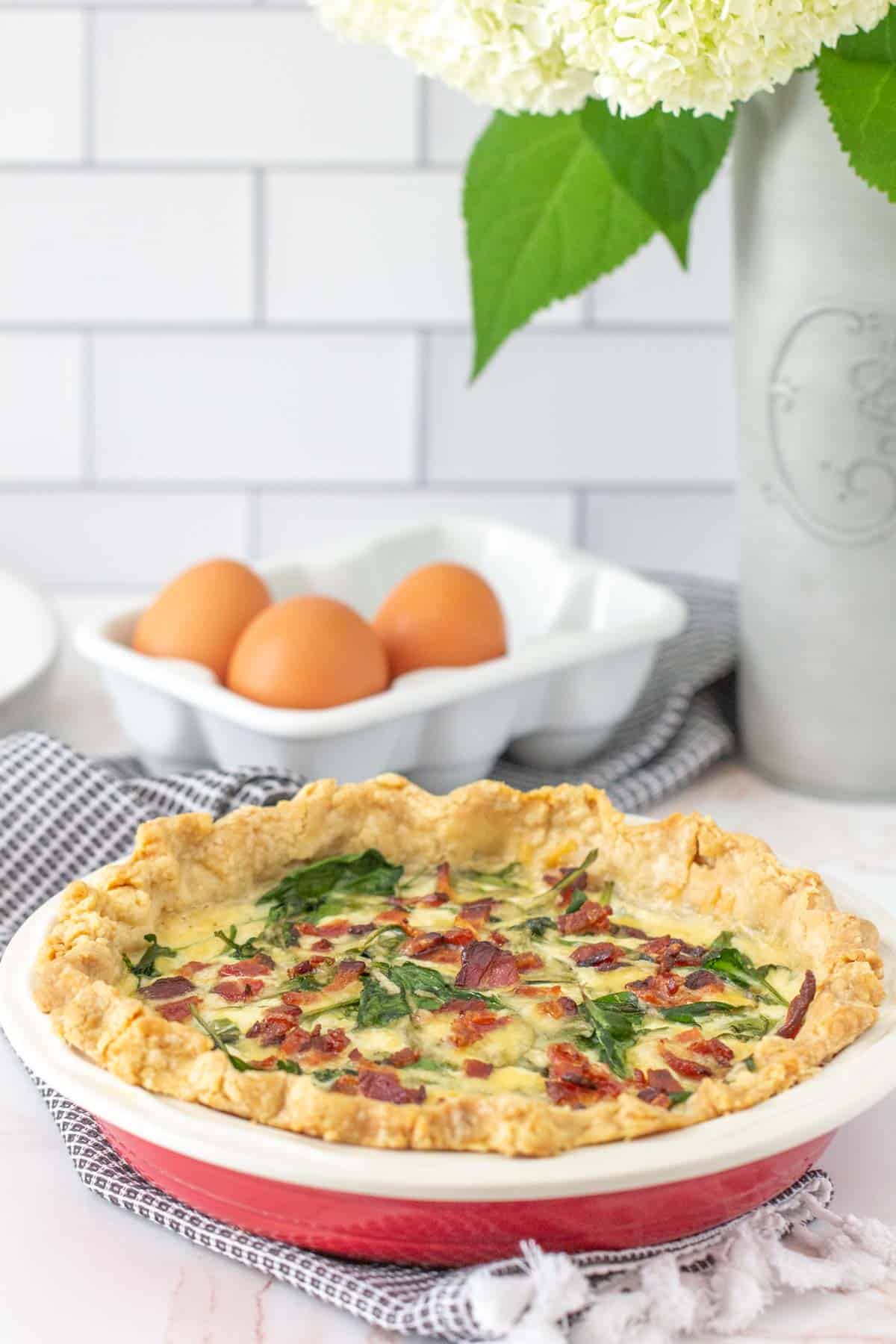 bacon spinach quiche in pie plate