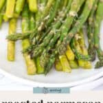 A plate of parmesan asparagus features roasted spears topped with a generous sprinkle of grated cheese.
