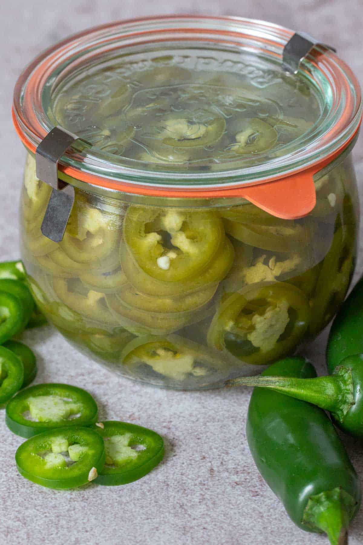 closed jar of pickled jalapeños