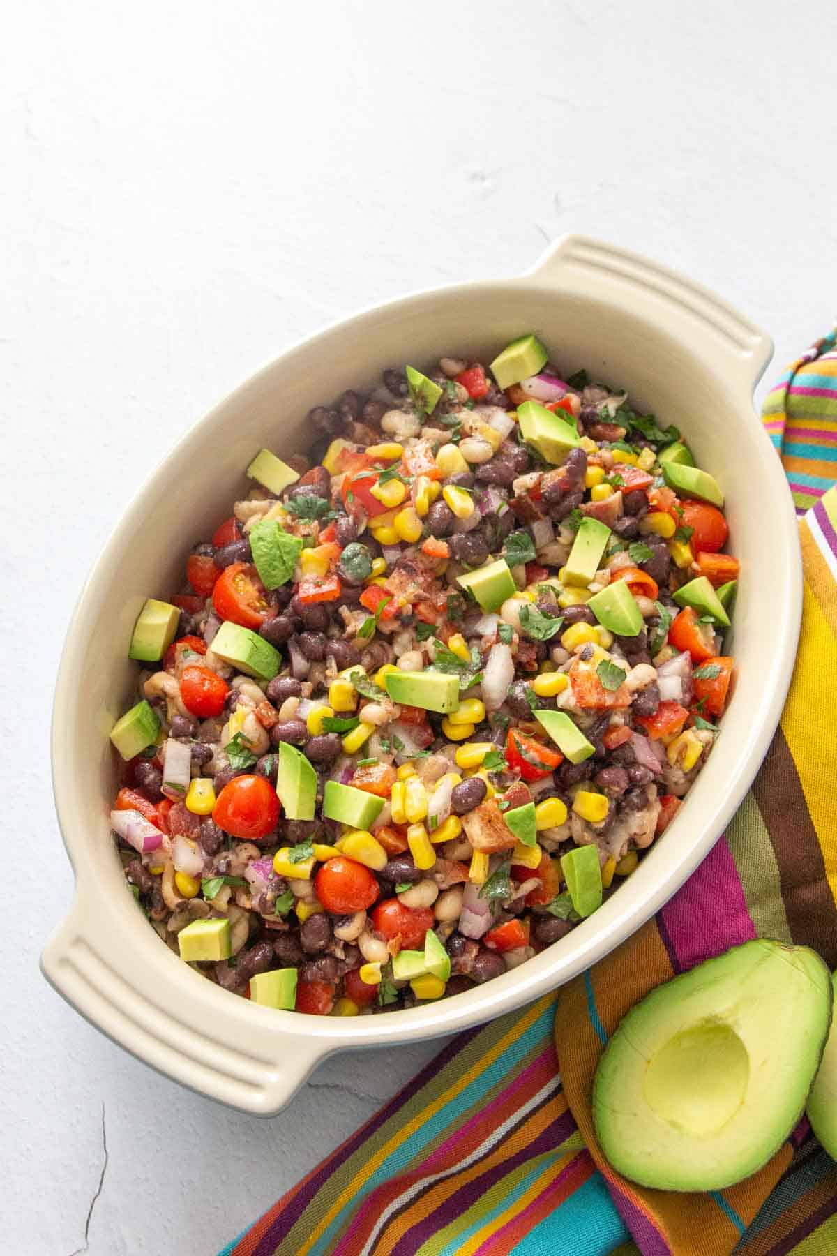 texas caviar with avocado in a serving dish
