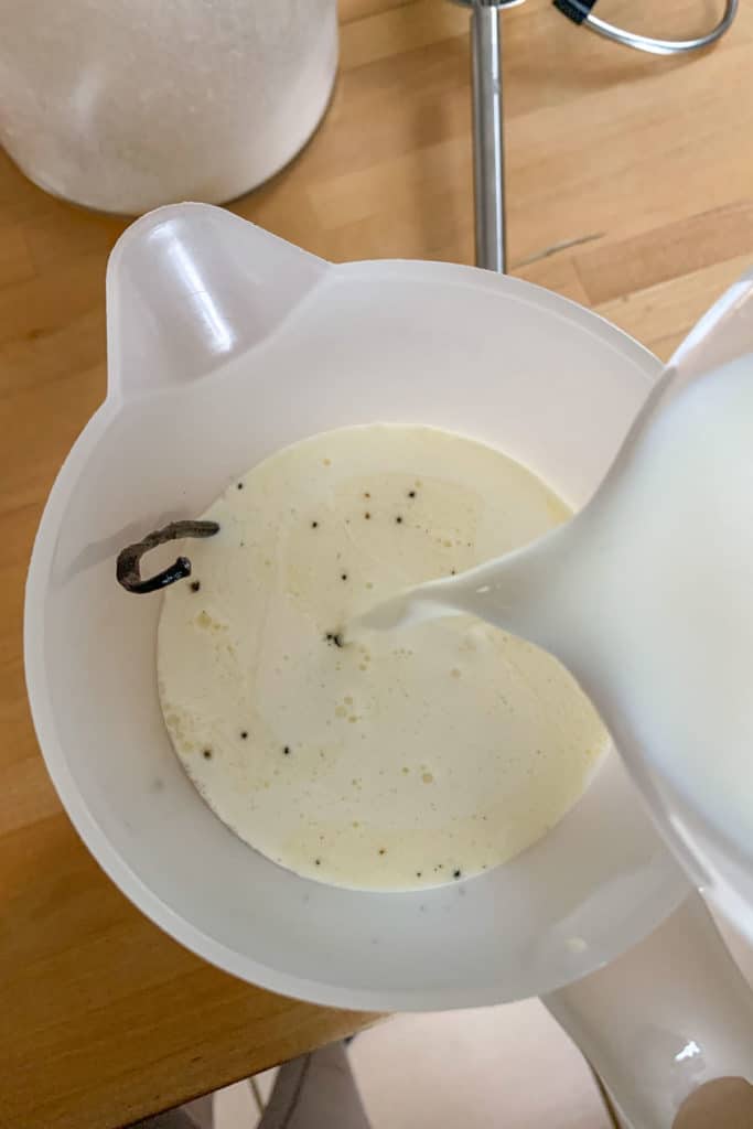 adding milk to vanilla ice cream base