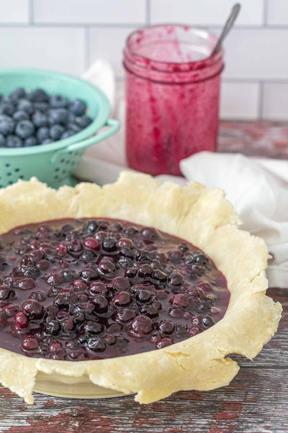 blueberry pie filling in unbaked crust
