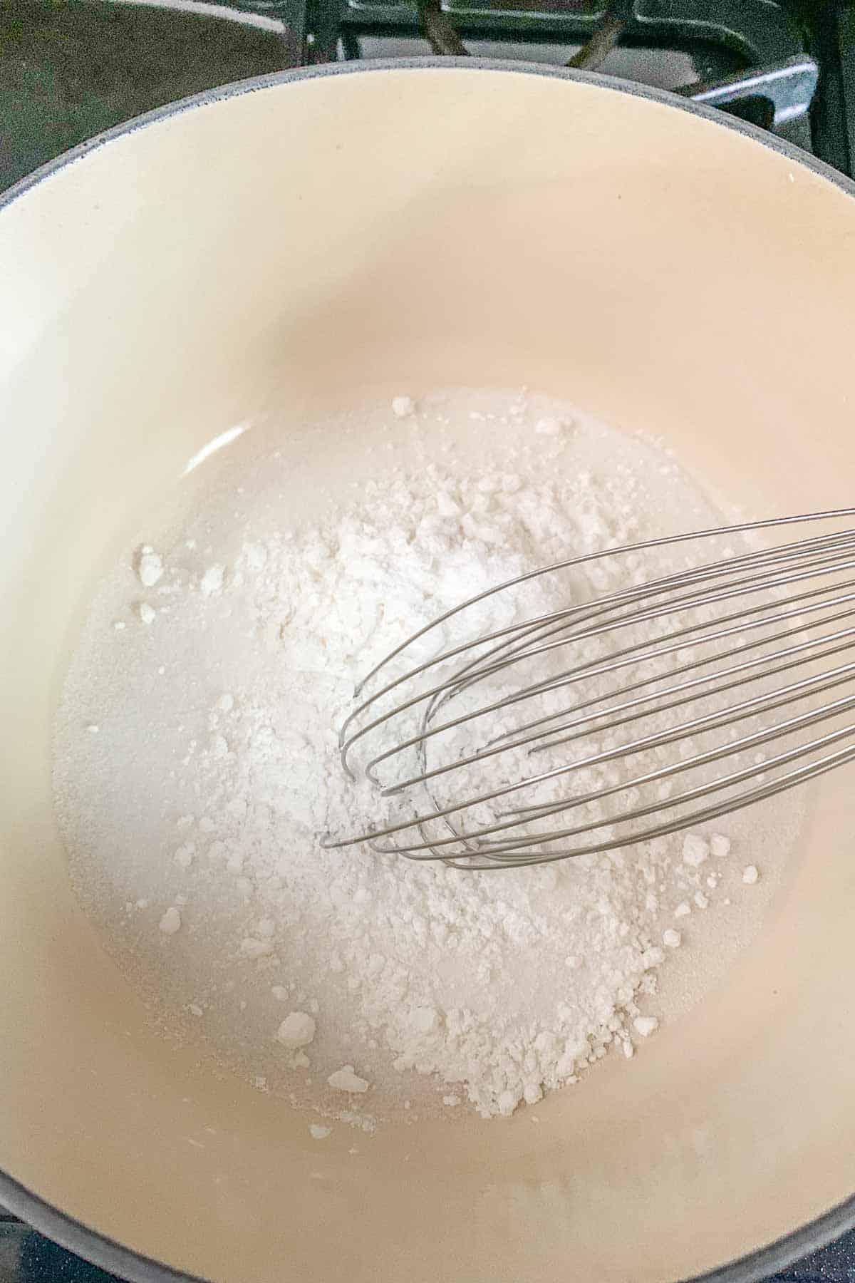 whisking together cornstarch and sugar in a pot